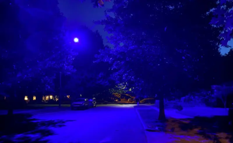 Why do some cities use blue street lights